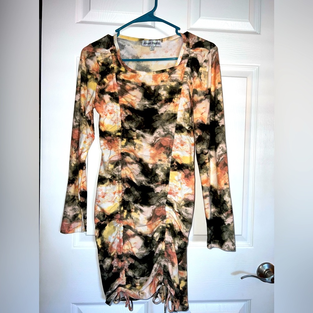 Fitted color splashed mini dress. Fun to wear